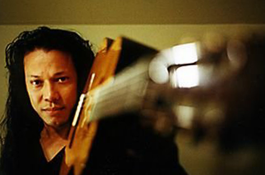 Guitar and Miguel's face
